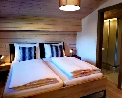 Ein Bett oder Betten in einem Zimmer der Unterkunft Haus Vordertiefenbach