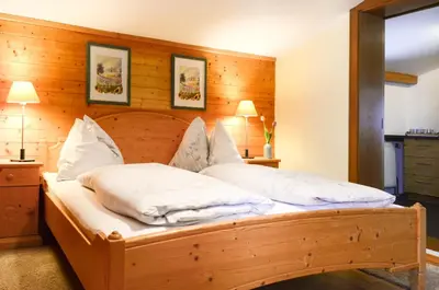 Ein Bett oder Betten in einem Zimmer der Unterkunft Ferienhaus Schnitzhof
