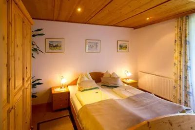 Ein Bett oder Betten in einem Zimmer der Unterkunft Da Bräuhauser