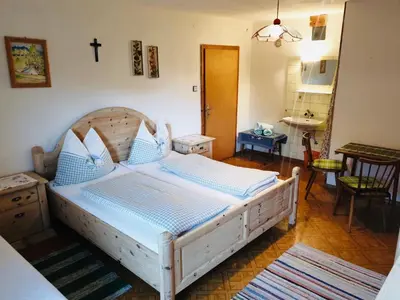 Ein Bett oder Betten in einem Zimmer der Unterkunft Zauneralm