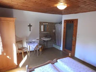 Ein Bett oder Betten in einem Zimmer der Unterkunft Zauneralm