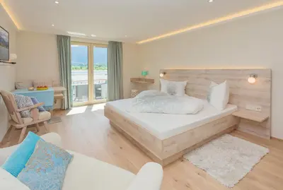 Ein Bett oder Betten in einem Zimmer der Unterkunft Arndt's Bootshaus