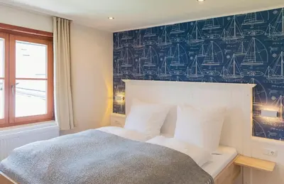Ein Bett oder Betten in einem Zimmer der Unterkunft Arndt's Bootshaus