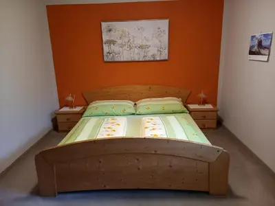 Ein Bett oder Betten in einem Zimmer der Unterkunft Gästehaus Marianne Baier