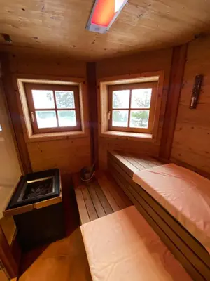 Ein Bett oder Betten in einem Zimmer der Unterkunft Chalet Sodamin Alpin mit Wellness