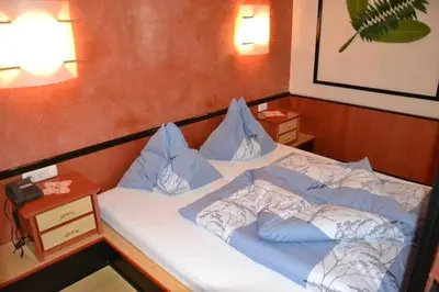 Ein Bett oder Betten in einem Zimmer der Unterkunft Gasthof Kemmetmüller