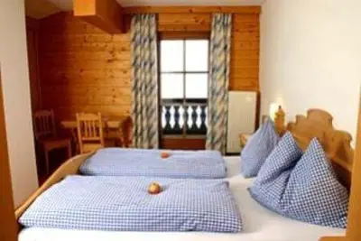 Ein Bett oder Betten in einem Zimmer der Unterkunft Berggasthof-Ferienbauernhof Habersatt