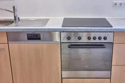 Küche/Küchenzeile in der Unterkunft Ferienwohnung Grimmingblick