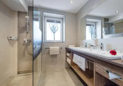 Ein Badezimmer in der Unterkunft Apartments & Garni Alpenrose