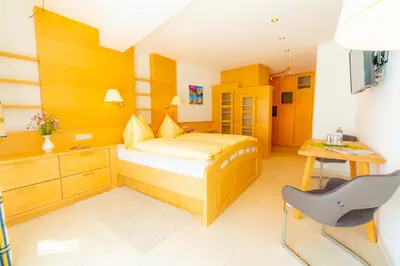 Ein Bett oder Betten in einem Zimmer der Unterkunft Pension Firn Sepp