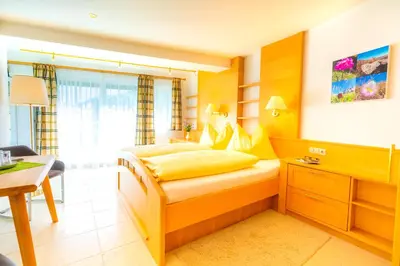 Ein Bett oder Betten in einem Zimmer der Unterkunft Pension Firn Sepp
