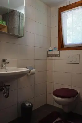 Ein Badezimmer in der Unterkunft Chalet Katrin