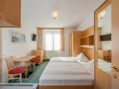 Ein Bett oder Betten in einem Zimmer der Unterkunft Appartement Resort Hanneshof