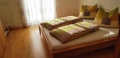 Ein Bett oder Betten in einem Zimmer der Unterkunft Ferienhaus Anke - Ausseerland Salzkammergut