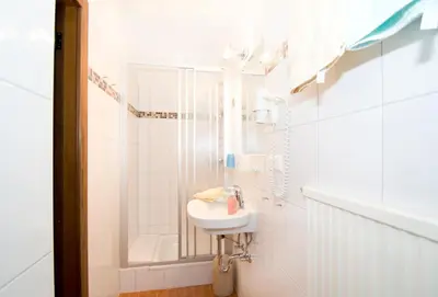 Ein Badezimmer in der Unterkunft Hotel Garni Hochwurzen