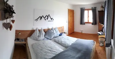 Ein Bett oder Betten in einem Zimmer der Unterkunft Ferienhaus Obermoser
