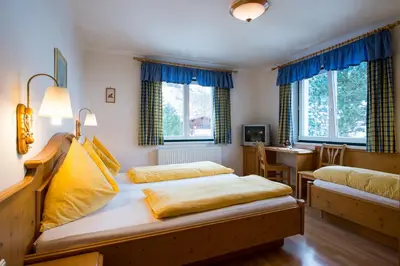Ein Bett oder Betten in einem Zimmer der Unterkunft Annaberger Musikantenwirt