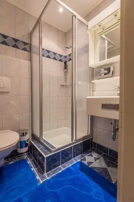 Ein Badezimmer in der Unterkunft Party Hotel Taverne