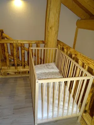 Ein Bett oder Betten in einem Zimmer der Unterkunft C.T.N. Loghouse