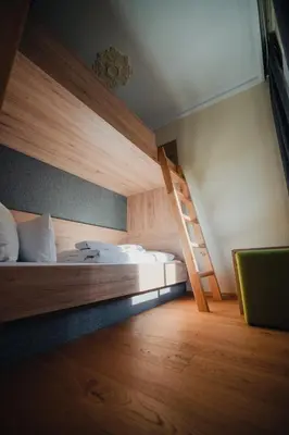 Ein Bett oder Betten in einem Zimmer der Unterkunft Hotel Restaurant DAS RÖSSL
