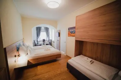 Ein Bett oder Betten in einem Zimmer der Unterkunft Hotel Restaurant DAS RÖSSL