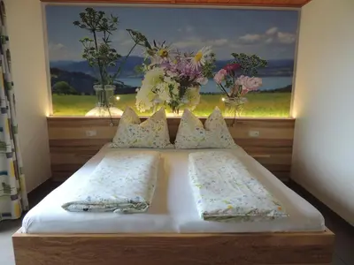 Ein Bett oder Betten in einem Zimmer der Unterkunft Ferienwohnungen Schöbringer
