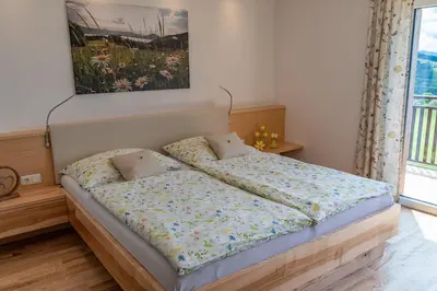 Ein Bett oder Betten in einem Zimmer der Unterkunft Ferienwohnungen Schöbringer