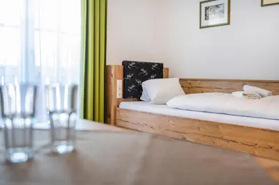 Ein Bett oder Betten in einem Zimmer der Unterkunft Appartements Baumanngut
