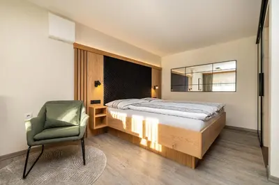 Ein Bett oder Betten in einem Zimmer der Unterkunft Haus Meneweger