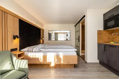 Ein Bett oder Betten in einem Zimmer der Unterkunft Haus Meneweger