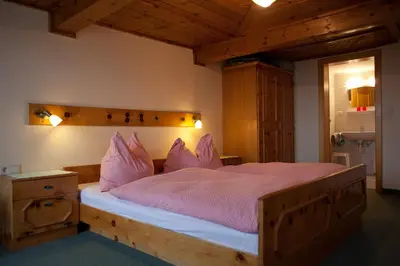Ein Bett oder Betten in einem Zimmer der Unterkunft Eggerhof