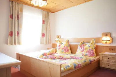 Ein Bett oder Betten in einem Zimmer der Unterkunft Eggerhof - Ferienhaus