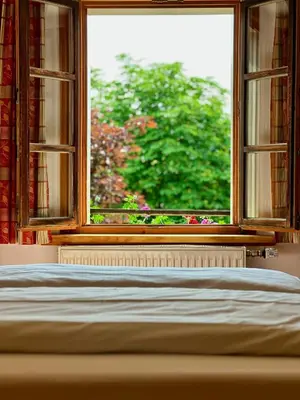 Ein Bett oder Betten in einem Zimmer der Unterkunft Lexenhof