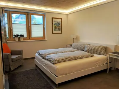 Ein Bett oder Betten in einem Zimmer der Unterkunft dasGams