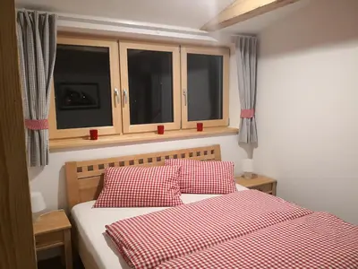 Ein Bett oder Betten in einem Zimmer der Unterkunft dasGams