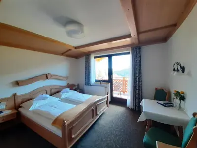 Ein Bett oder Betten in einem Zimmer der Unterkunft Pension Bergpracht