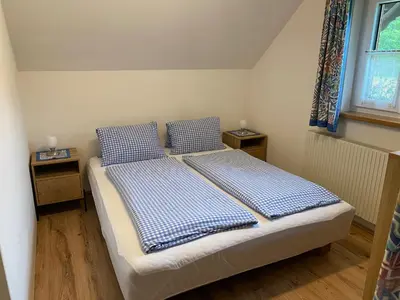 Ein Bett oder Betten in einem Zimmer der Unterkunft Biobauernhof Hauserbauer