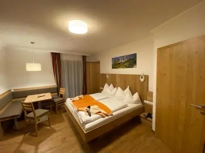 Ein Bett oder Betten in einem Zimmer der Unterkunft Der Brückenhof Ramsau
