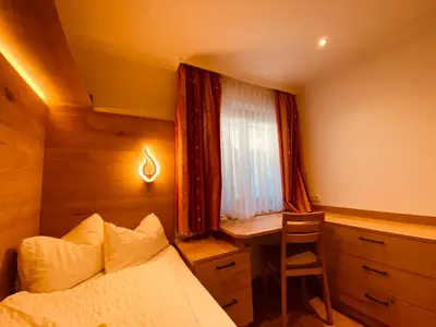 Ein Bett oder Betten in einem Zimmer der Unterkunft Der Brückenhof Ramsau