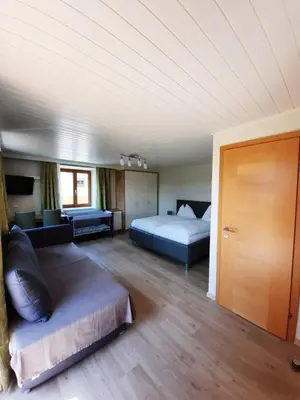 Ein Bett oder Betten in einem Zimmer der Unterkunft Pension Kreuzinger, 5310 Tiefgraben