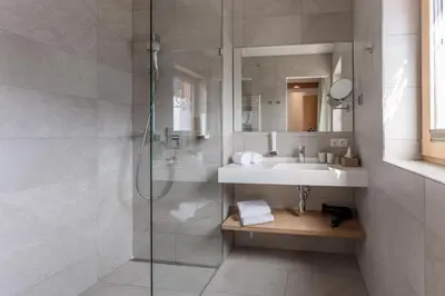 Ein Badezimmer in der Unterkunft Aparthotel Ursprung
