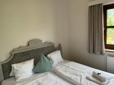 Ein Bett oder Betten in einem Zimmer der Unterkunft Kesselgrubs Wohlfühlappartements