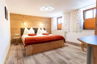 Ein Bett oder Betten in einem Zimmer der Unterkunft Simonegg