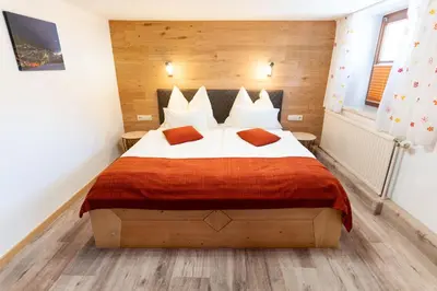 Ein Bett oder Betten in einem Zimmer der Unterkunft Simonegg