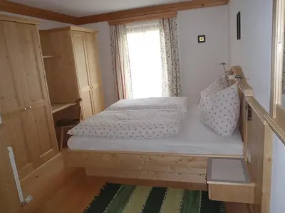 Ein Bett oder Betten in einem Zimmer der Unterkunft Russbachbauer