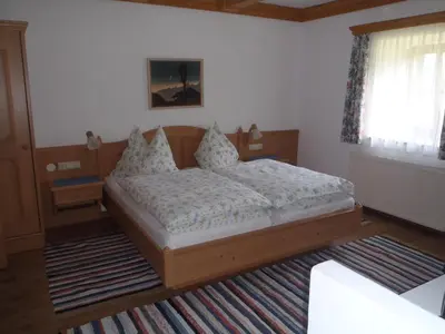 Ein Bett oder Betten in einem Zimmer der Unterkunft Russbachbauer