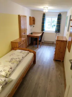 Ein Bett oder Betten in einem Zimmer der Unterkunft Ferienhaus-Loidl