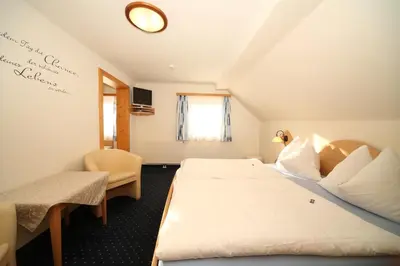 Ein Bett oder Betten in einem Zimmer der Unterkunft Aignerhof