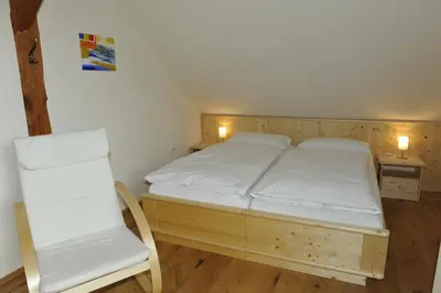 Ein Bett oder Betten in einem Zimmer der Unterkunft Gut Neusess