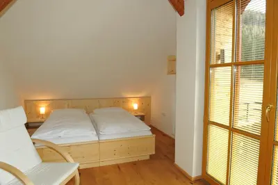 Ein Bett oder Betten in einem Zimmer der Unterkunft Gut Neusess